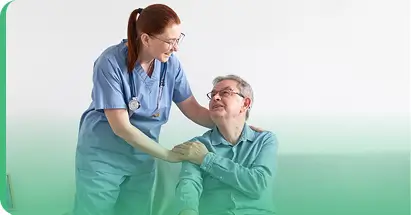 Healthcare worker supports older adult; scene promotes compassionate care.
